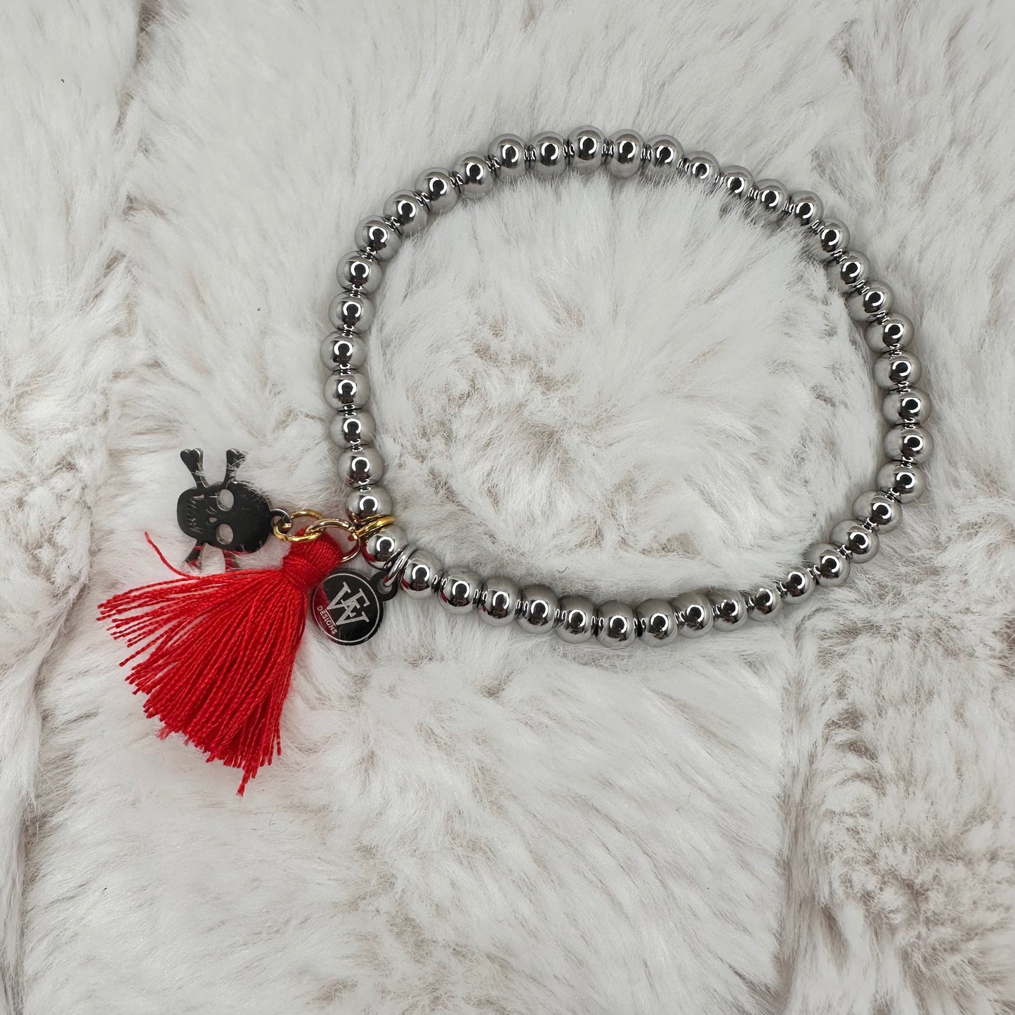 Stainless steel beaded bracelet with Skull and Tassel | Erika Williner Designs