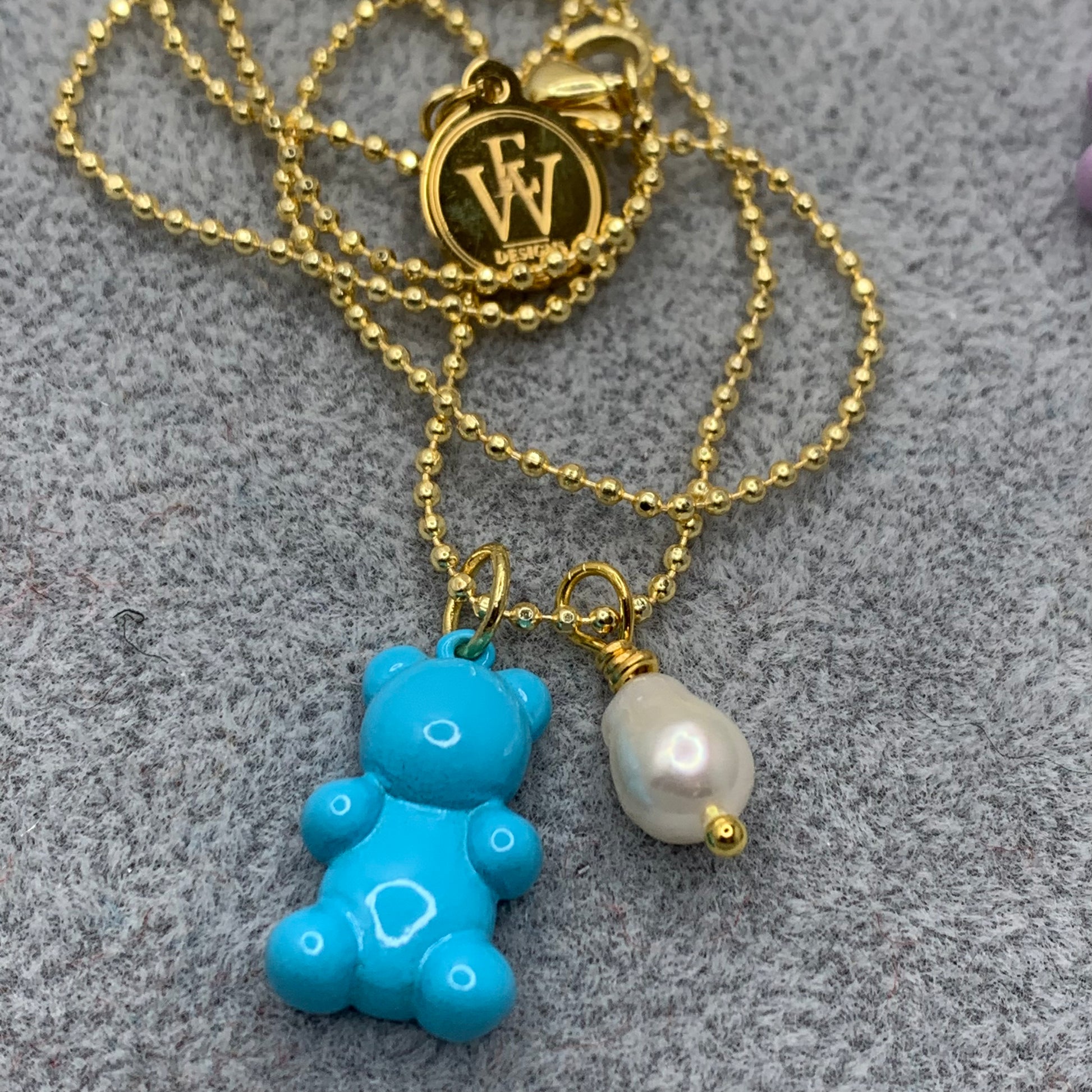 Light blue enameled gummy bear pendant