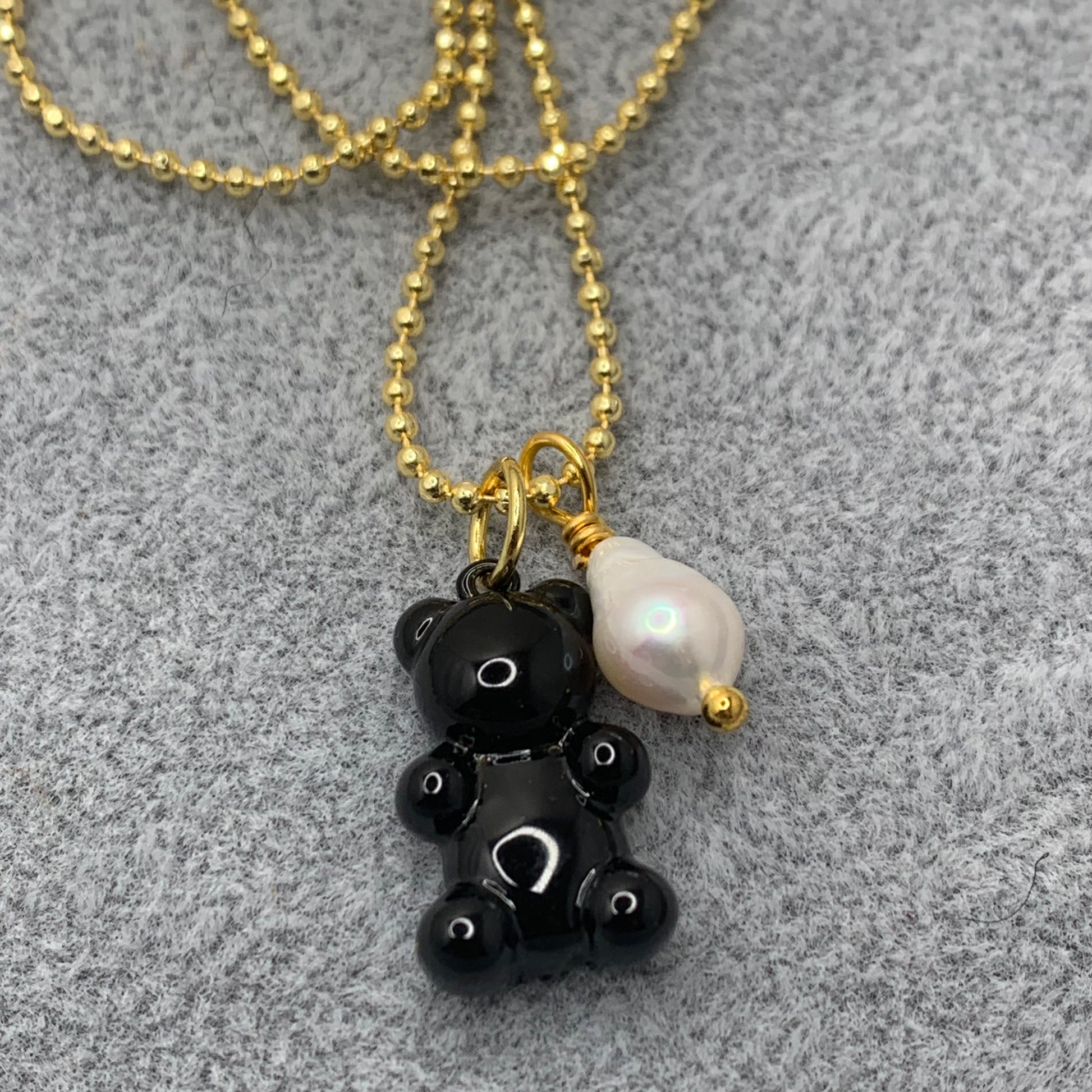 Black enameled gummy bear pendant