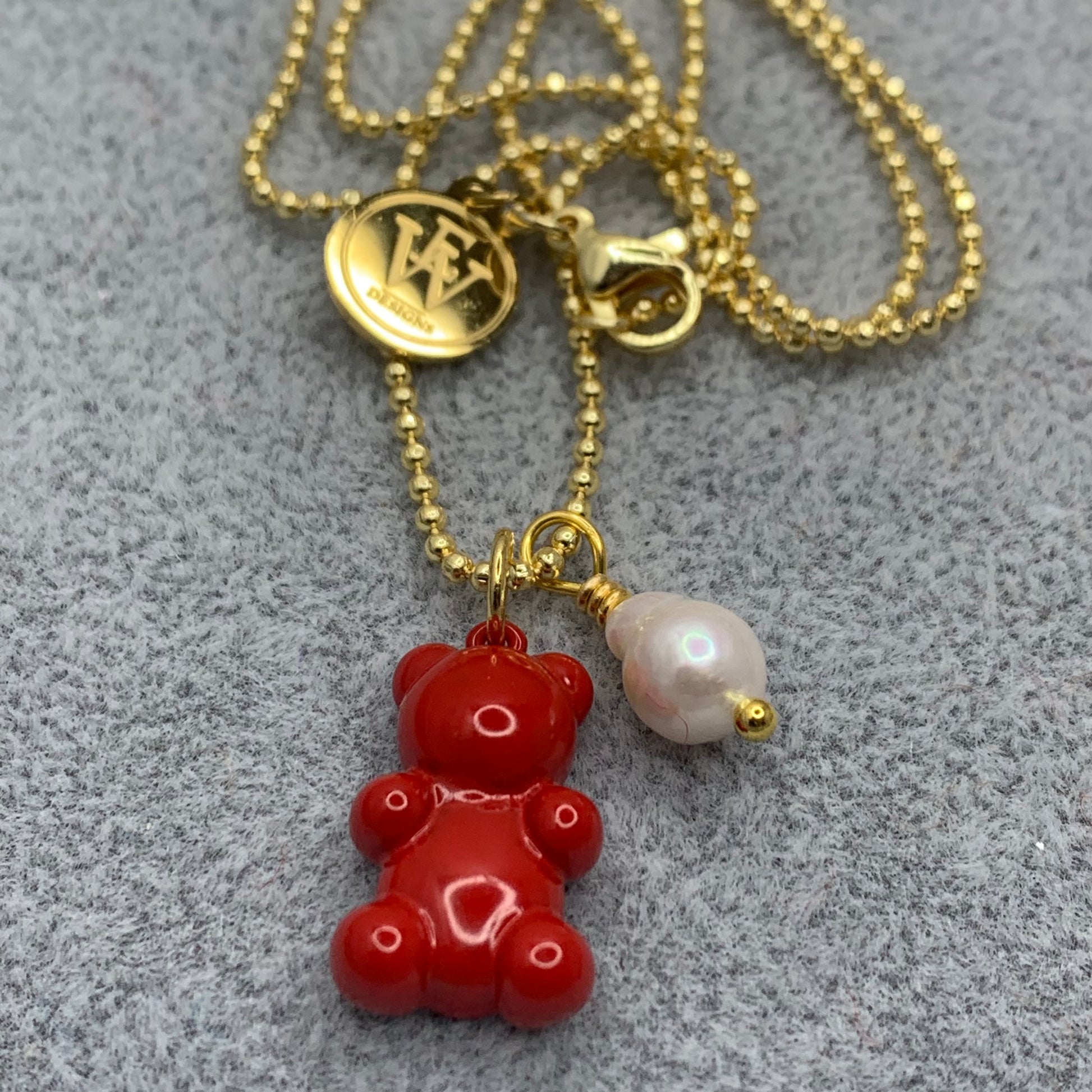 Mini ball and chain necklace with red enameled gummy bear pendant