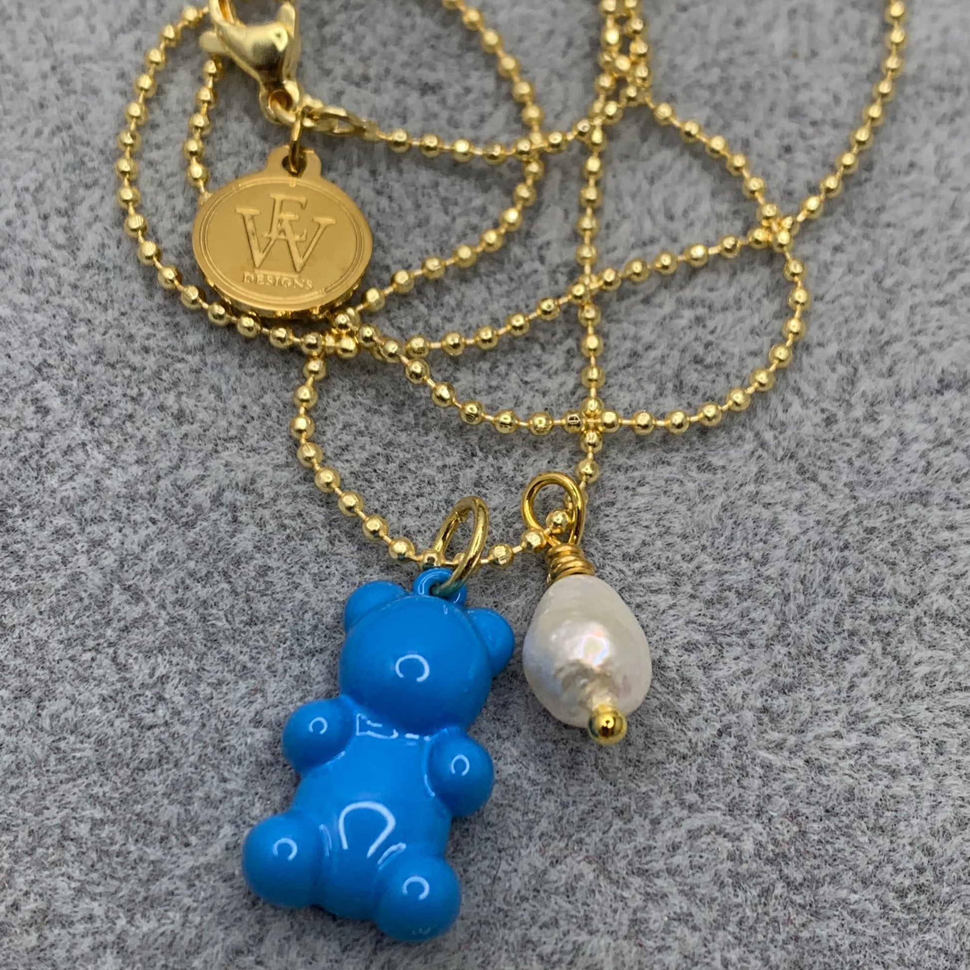 Blue enameled gummy bear pendant