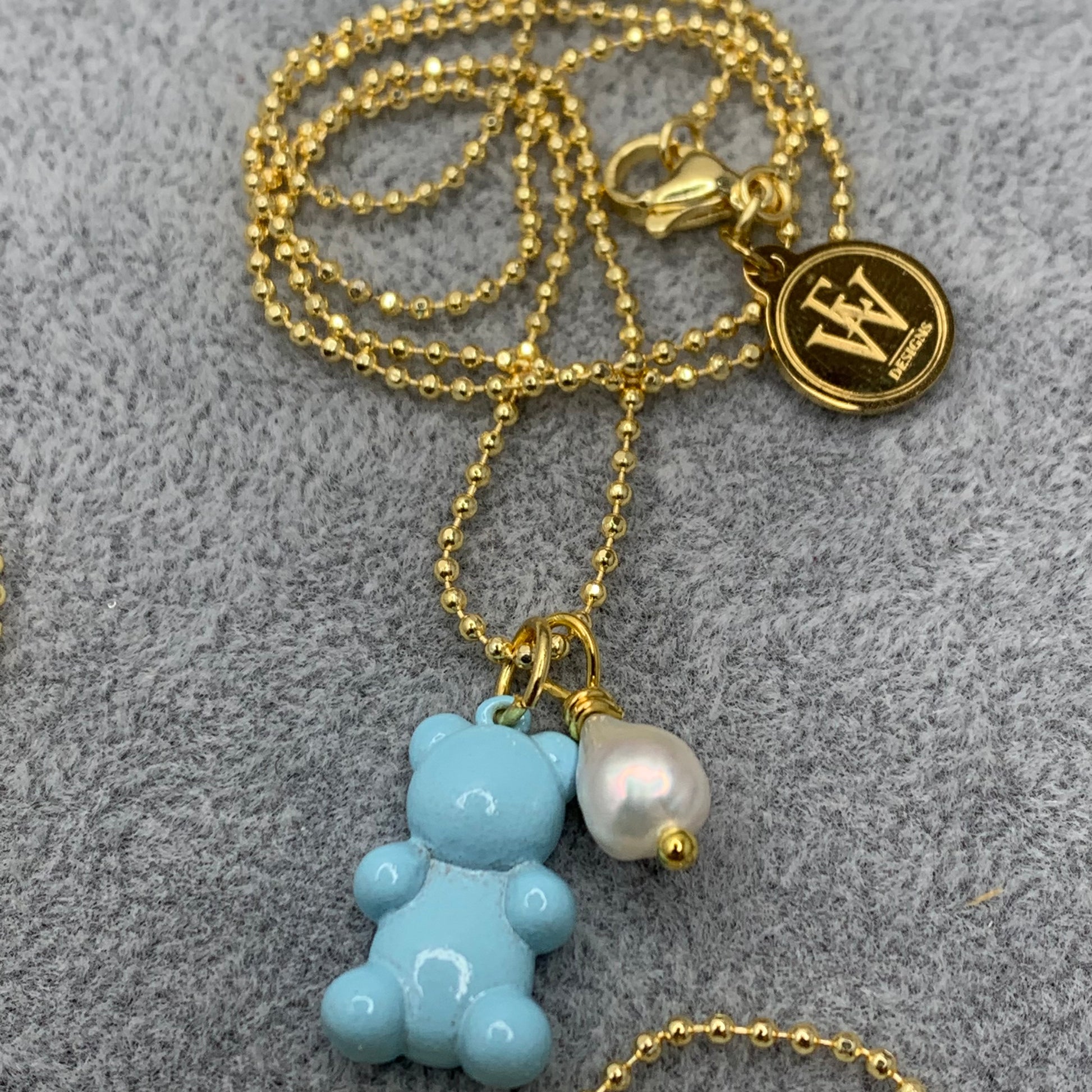 Teal gummy bear pendant