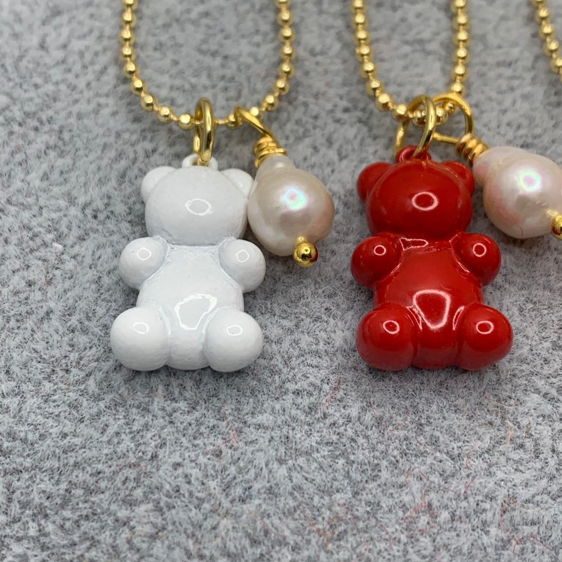 Mini ball and chain necklace with white enameled gummy bear pendant